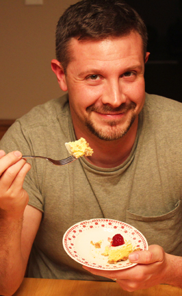 Josh Heston with cheesecake